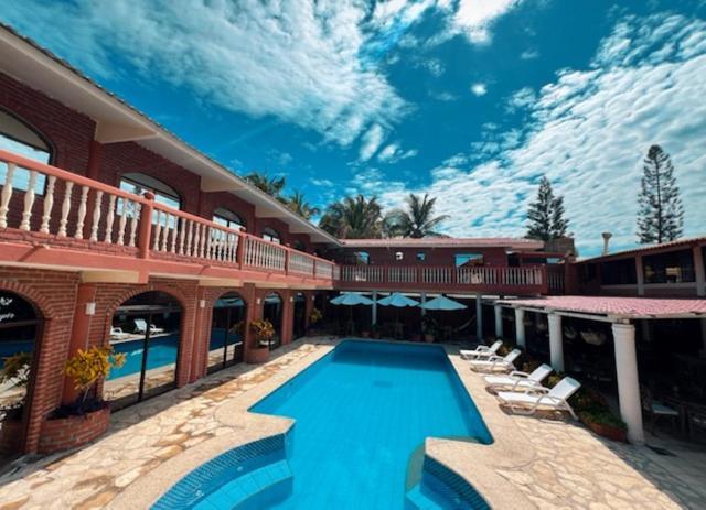 Suite Hotel Romanos General Villamil Exterior foto